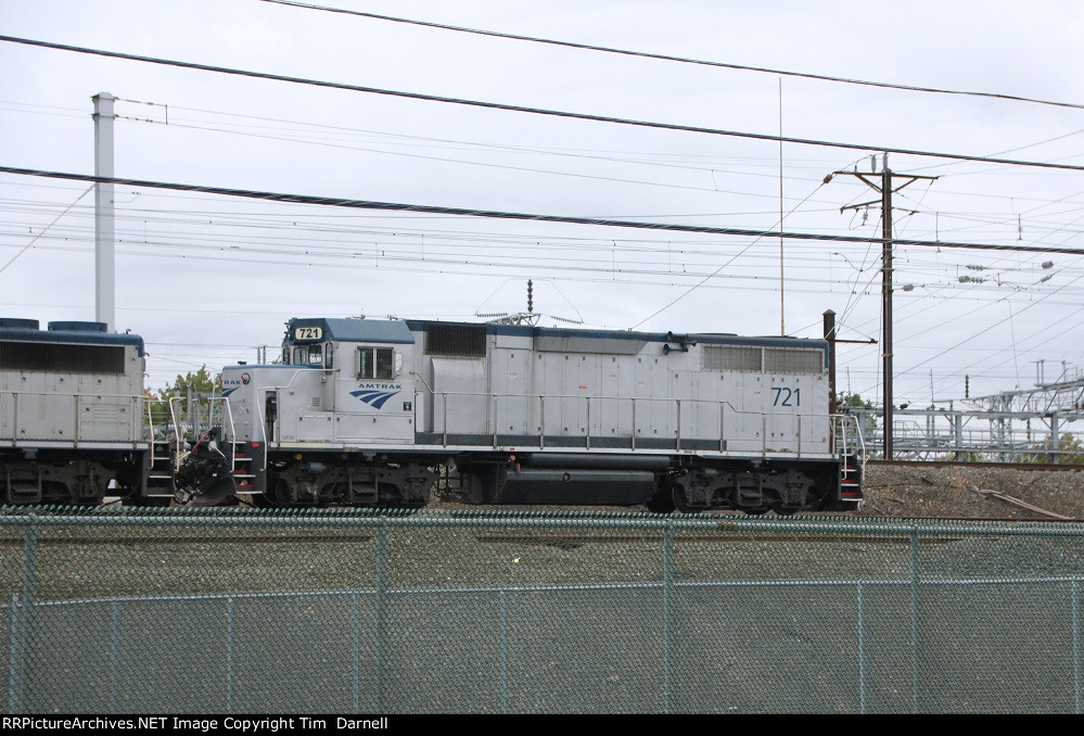 AMTK 721 leading a work train